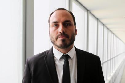 Carlos Bolsonaro, son of Brazils President-elect Jair Bolsonaro, is pictured during his visit to the Superior Court of Labour in Brasilia, on November 13, 2018. - Brazils President-elect Jair Bolsonaro takes office on January 1, 2019. (Photo by Sergio LIMA / AFP)