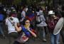 Universitários venezuelanos enfrentam polícia em protesto contra Maduro