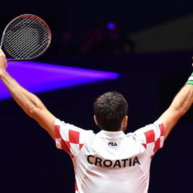  Croatias Marin Cilic celebrates after victory in his singles rubber against Frances Jo-Wilfried Tsonga during the Davis Cup final tennis match between France and Croatia at The Pierry-Mauroy Stadium at Villeneuve dAscq in northern France on November 23, 2018. (Photo by PHILIPPE HUGUEN / AFP)Editoria: SPOLocal: Villeneuve-dAscqIndexador: PHILIPPE HUGUENSecao: tennisFonte: AFPFotógrafo: STF