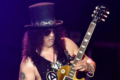 INDIO, CA - APRIL 16: Lead guitarist Slash of Guns N Roses performs onstage during day 2 of the 2016 Coachella Valley Music & Arts Festival Weekend 1 at the Empire Polo Club on April 16, 2016 in Indio, California.   Kevin Winter/Getty Images for Coachella/AFP