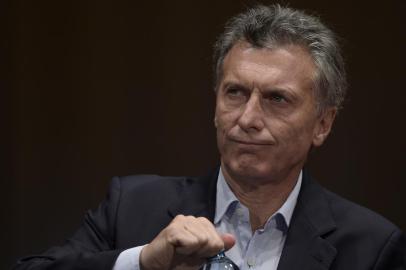  Argentinas president elect Mauricio Macri gestures during a press conference in Buenos Aires on November 23, 2015 the day after winning the run-off election against the ruling Frente para la Victoria party candidate Daniel Scioli. Macri, a former football executive expected to be Argentinas most economically liberal leader since the 1990s, promised a marvelous new era for his country, beleaguered by years of economic instability.       AFP PHOTO / JUAN MABROMATA / AFP / JUAN MABROMATAEditoria: POLLocal: Buenos AiresIndexador: JUAN MABROMATASecao: national electionsFonte: AFPFotógrafo: STF