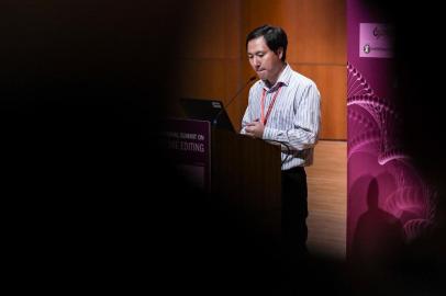 Chinese scientist He Jiankui reacts as he speaks at the Second International Summit on Human Genome Editing in Hong Kong on November 28, 2018. (Photo by Anthony WALLACE / AFP)