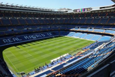 (FILES) This file photo taken on May 21, 2010 shows an inside view of Real Madrids Santiago Bernabeu stadium in Madrid. - Real Madrids Santiago Bernabeu stadium will host the second leg of the Copa Libertadores final between Argentine rivals River Plate and Boca Juniors on December 9, 2018. (Photo by Mladen ANTONOV / AFP)