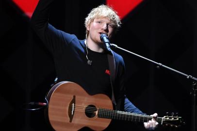 Ed Sheeran performs at the Z100s iHeartRadio Jingle Ball 2017 at Madison Square Garden on December 7, 2017 in New York. (Photo by ANGELA WEISS / AFP)