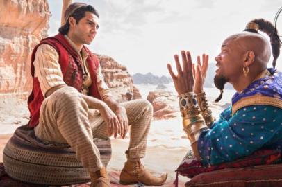 Mena Massoud as the street rat with a heart of gold, Aladdin, and Will Smith as the larger-than-life Genie in Disneyâs ALADDIN, directed by Guy Ritchie.