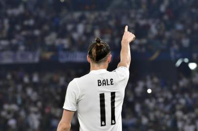  Real Madrids Welsh forward Gareth Bale celebrates his goal during the semi final football match of the FIFA Club World Cup 2018 tournament between Japans Kashima Antlers and Spains Real Madrid at the Zayed Sports City Stadium in Abu Dhabi, the capital of the United Arab Emirates, on December 19, 2018. (Photo by Giuseppe CACACE / AFP)Editoria: SPOLocal: Abu DhabiIndexador: GIUSEPPE CACACESecao: soccerFonte: AFPFotógrafo: STF