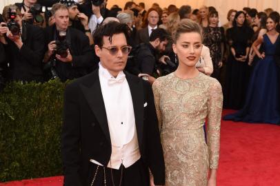 488658201Actors Johnny Depp (L) and Amber Heard arrive at the Costume Institute Benefit at The Metropolitan Museum of Art May 5, 2014 in New York. AFP PHOTO/Timothy A. CLARYEditoria: ACELocal: New YorkIndexador: TIMOTHY A. CLARYSecao: FashionFonte: AFPFotógrafo: STF