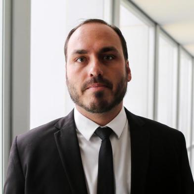 Carlos Bolsonaro, son of Brazils President-elect Jair Bolsonaro, is pictured during his visit to the Superior Court of Labour in Brasilia, on November 13, 2018. - Brazils President-elect Jair Bolsonaro takes office on January 1, 2019. (Photo by Sergio LIMA / AFP)