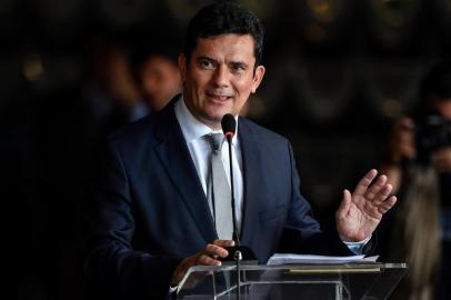  Brazil's new Justice Minister Judge Sergio Moro delivers a speech during the ceremony to take office, a day after the swearing-in of the country's new government, at the Justice Ministry in Brasilia, on January 2, 2019. - Brazil's new far-right President Jair Bolsonaro declared a crusade against crime, corruption and leftwing ideology as he took office on January 1 for a four-year term at the helm of Latin America's biggest nation. (Photo by Nelson ALMEIDA / AFP)Editoria: POLLocal: BrasíliaIndexador: NELSON ALMEIDASecao: governmentFonte: AFPFotógrafo: STF