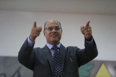  Wilson Witzel dá posse ao novo secretário de Estado de Polícia CivilO governado do Rio de Janeiro, Wilson Witzel, durante cerimônia de posse do novo secretário de Estado de Polícia Civil, delegado Marcus Vinícius de Almeida Braga.Tomaz Silva/Agência Brasil 