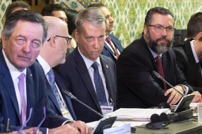 (L-R) Chiles Foreign Minister Roberto Ampuero, Canadas Parliamentary Secretary to theMinister of Foreign Affairs Andrew Leslie and Brazils Foreign Minister Ernesto Araujo take part in a meeting of the so-called Lima Group, which includes Canada and most of Latin Americas top powers, to assess the current situation in Venezuela, in Lima on January 4, 2019. - The 14-member regional group, established in August 2017 with the aim of looking for a peaceful exit to the crisis in Venezuela, refuses to recognize the countrys May elections, in which President Nicolas Maduro won a new six-year term in a vote marred by irregularities. Maduro prepares to be sworn in on January 10, 2019 for his second term at the head of the crisis-racked country. (Photo by Cris BOURONCLE / AFP)