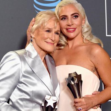 SANTA MONICA, CA - JANUARY 13: Glenn Close (L), winner of Best Actress for The Wife, and Lady Gaga, winner of Best Actress for A Star Is Born, pose in the press room during the 24th annual Critics Choice Awards at Barker Hangar on January 13, 2019 in Santa Monica, California.   Frazer Harrison/Getty Images/AFP