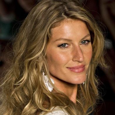 Brazilian supermodel Gisele Bundchen presents a creation by Colcci during the 2015 Summer