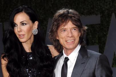 Mick Jagger e L&#39;Wren Scott em uma festa da revista Vanity Fair, em 2009mick-jagger-e-