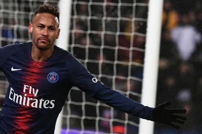 Paris Saint-Germain's Brazilian forward Neymar celebrates after scoring a goal during the French L1 football match Paris Saint-Germain (PSG) vs Guingamp (EAG), on January 19, 2019 at the Parc des Princes stadium in Paris. (Photo by Anne-Christine POUJOULAT / AFP)