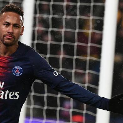 Paris Saint-Germain's Brazilian forward Neymar celebrates after scoring a goal during the French L1 football match Paris Saint-Germain (PSG) vs Guingamp (EAG), on January 19, 2019 at the Parc des Princes stadium in Paris. (Photo by Anne-Christine POUJOULAT / AFP)