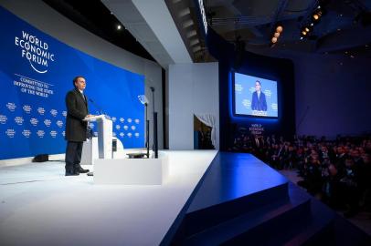 Brazilian President Jair Bolsonaro delivers a speech at the World Economic Forum (WEF) annual meeting, on January 22, 2019 in Davos, eastern Switzerland. (Photo by Fabrice COFFRINI / AFP)