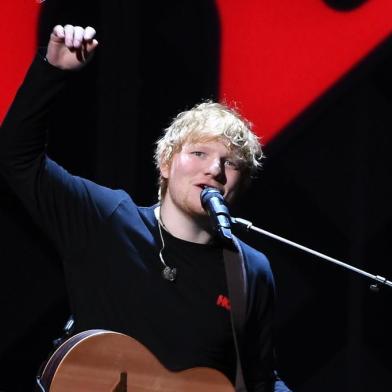 Ed Sheeran performs at the Z100s iHeartRadio Jingle Ball 2017 at Madison Square Garden on December 7, 2017 in New York. (Photo by ANGELA WEISS / AFP)