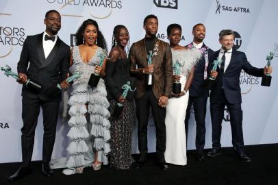 LOS ANGELES, CALIFORNIA - JANUARY 27: (L-R) Sterling K. Brown, winner of Outstanding Performance by a Cast in a Motion Picture for Black Panther and Outstanding Performance by an Ensemble in a Drama Series for This Is Us; Angela Bassett, Lupita Nyongo, Chadwick Boseman, Danai Gurira, Michael B. Jordan, and Andy Serkis, winners of Outstanding Performance by a Cast in a Motion Picture for Black Panther, pose in the press room at the 25th annual Screen Actors Guild Awards at The Shrine Auditorium on January 27, 2019 in Los Angeles, California.   Sarah Morris/Getty Images/AFP