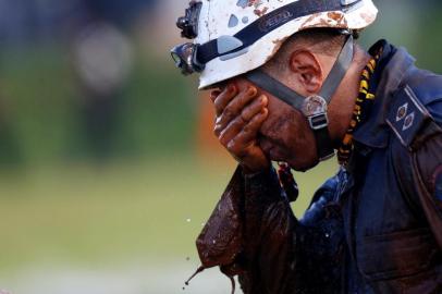 A member of rescue team reacts, upon returning from the mission, after a tailings dam owned by Brazilian mining company Vale SA collapsed, in BrumadinhoA member of rescue team reacts, upon returning from the mission, after a tailings dam owned by Brazilian mining company Vale SA collapsed, in Brumadinho, Brazil January 27, 2019. REUTERS/Adriano Machado ORG XMIT: SMS265Local: BRUMADINHO ;Brazil