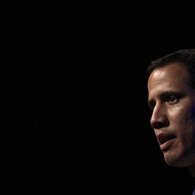  Venezuelas opposition leader and self-proclaimed acting president Juan Guaido delivers a speech during a meeting at the Venezuelan Federation of Chambers of Commerce and Production (Fedecamaras), the countrys main business union, in Caracas, on February 5, 2019. - World powers are taking sides in the struggle between the rivals to lead Venezuela, which has pitted some Western nations against Russia, China and others. Inside the country, National Assembly leader Juan Guaido, 35, is vying to lure military commanders to switch their allegiance to him away from President Nicolas Maduro, 56. (Photo by Federico PARRA / AFP)Editoria: WARLocal: CaracasIndexador: FEDERICO PARRASecao: unionsFonte: AFPFotógrafo: STF