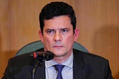 Brazilian Federal Judge Sergio Moro, incoming Brazilian Justice and Public Security Minister, gestures a press conference at the Federal Justice Court in Curitiba, Brazil on November 06, 2018. (Photo by Heuler Andrey / AFP) 