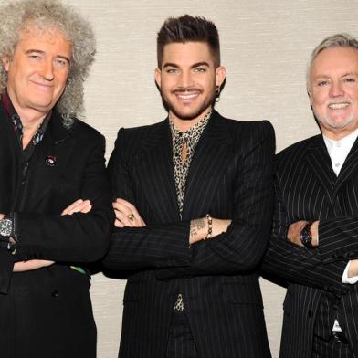 NEW YORK, NY - MARCH 06:  (Exclusive Coverage) Brian May, Adam Lambert and Roger Taylor  backstage before their Queen (Brian May and Roger Taylor) + Adam Lambert North American tour announcement at Madison Square Garden on March 6, 2014 in New York City. The tour kicks off on June 19, 2014 in Chicago.  (Photo by Kevin Mazur/WireImage) *** Local Caption *** Brian May; Adam Lambert; Roger Taylor Queen + Adam Lambert