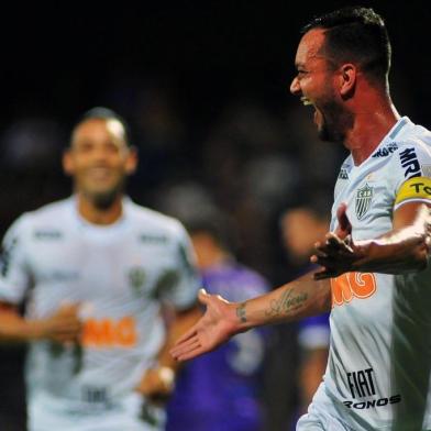  Rever, of Brazils Atletico Mineiro celebrates after scoring against Uruguays Defensor during their Copa Libertadores football match at the Luis Franzini stadium in Montevideo, Uruguay on February 20, 2019. (Photo by DANTE FERNANDEZ / AFP)Editoria: SPOLocal: MontevideoIndexador: DANTE FERNANDEZSecao: soccerFonte: AFPFotógrafo: STR