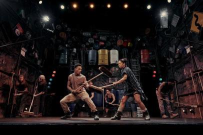 Actors perform in âStomp,â at the Orpheum Theatre in New York, Jan. 30, 2019. About to celebrate the 25th anniversary of its New York premiere, âStompâ has endured, not thanks to high-priced sets and effects, but from wielding everyday objects like brooms, garbage cans and wooden poles to create a wordless percussive explosion onstage. (Vincent Tullo/The New York Times)