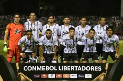 Paraguays Libertad players pose before their Copa Libertadores football match against Colombias Atletico Nacional at Nicolas Leoz Stadium in Asuncion, Paraguay on February 21, 2019. (Photo by NORBERTO DUARTE / AFP)