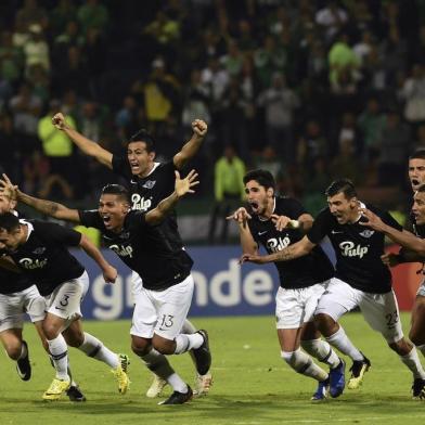  Paraguays Libertad players celebrates after defeating Colombias Atletico Nacional by penalties during their Copa Libertadores game at Atanasio Girardot stadium, in Medellin, Antioquia department, Colombia on February 28, 2019. (Photo by JOAQUIN SARMIENTO / AFP)Editoria: SPOLocal: MedellínIndexador: JOAQUIN SARMIENTOSecao: soccerFonte: AFPFotógrafo: STR