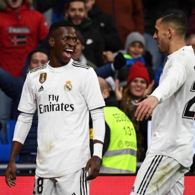  Real Madrids Brazilian forward Vinicius Junior (L) celebrates scoring a goal during the Spanish league football match Real Madrid CF against Club Deportivo Alaves at the Santiago Bernabeu stadium in Madrid on February 3, 2019. (Photo by GABRIEL BOUYS / AFP)Editoria: SPOLocal: MadridIndexador: GABRIEL BOUYSSecao: soccerFonte: AFPFotógrafo: STF