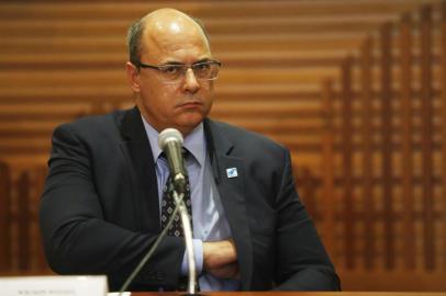  Rio de Janeiro Governor Wilson Witzel attends a press conference in Rio de Janeiro on March 12, 2019. - Two police officers were arrested Tuesday in the killing last March 14, 2018 of gay Rio de Janeiro city councillor Marielle Franco and her driver, prosecutors said, a brazen murder that shocked Brazil. (Photo by Daniel RAMALHO / AFP)Editoria: CLJLocal: Rio de JaneiroIndexador: DANIEL RAMALHOSecao: crimeFonte: AFPFotógrafo: STR