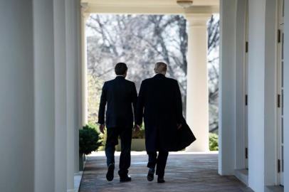 Brazils President Jair Bolsonaro and US President Donald Trump leave after a press conference in the Rose Garden of the White House March 19, 2019 in Washington, DC. (Photo by Brendan Smialowski / AFP)