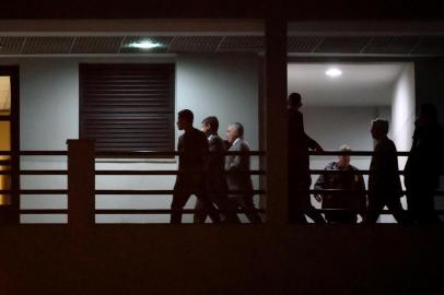  Brazils former president (2016-2018) Michel Temer (3-L), arrives under police escort at the Federal Police headquarters in Rio de Janeiro, Brazil, on March 21, 2019 after being arrested earlier in Sao Paulo as part of the sprawling Car Wash anti-corruption probe. - Temer was the leader of a criminal organization involved in embezzlement and money laundering, the federal prosecutor alleged Thursday, after the former leader was arrested as part of the Car Wash probe. (Photo by Mauro PIMENTEL / AFP)Editoria: CLJLocal: Rio de JaneiroIndexador: MAURO PIMENTELSecao: policeFonte: AFPFotógrafo: STF