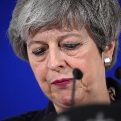  British Prime Minister Theresa May holds a press conference on March 22, 2019, at the end of the first day of an EU summit focused on Brexit, in Brussels. - European Union leaders meet in Brussels on March 21 and 22, for the last EU summit before Britains scheduled exit of the union. (Photo by EMMANUEL DUNAND / AFP)Editoria: POLLocal: BrusselsIndexador: EMMANUEL DUNANDSecao: diplomacyFonte: AFPFotógrafo: STF