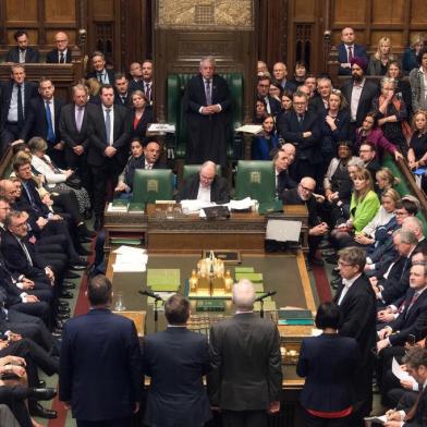 A handout photograph taken and released by the UK Parliament on March 29, 2019 shows Speaker of the HOuse of Commons John Bercow (C) listen as tellers (R-L) Labour MPs Thangam Debbonaire and Nic Dakin and Conservative MPs Andrew Stephenson and Craig Whittaker report the results of the vote on the Governments EU Withdrawl Agreement Bill in the House of Commons in London. - British MPs on Friday rejected Prime Minister Theresa Mays EU divorce deal for a third time, opening the way for a long delay to Brexit -- or a potentially catastophic no deal withdrawal in two weeks. (Photo by MARK DUFFY / UK PARLIAMENT / AFP) / EDITORS NOTE THE IMAGE HAS BEEN DIGITALLY ALTERED AT SOURCE TO OBSCURE VISIBLE DOCUMENTS  - RESTRICTED TO EDITORIAL USE - NO USE FOR ENTERTAINMENT, SATIRICAL, ADVERTISING PURPOSES - MANDATORY CREDIT  AFP PHOTO /Mark DUFFY/ UK Parliament