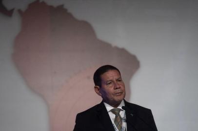 Brazilian Vice-President Hamilton Mourao delivers a speech during the opening ceremony of the Defence and Security International Fair Exhibition (LAAD 2019) at Riocentro Expo Centre in Rio de Janeiro, Brazil, on April 2, 2019. (Photo by Mauro PIMENTEL / AFP)