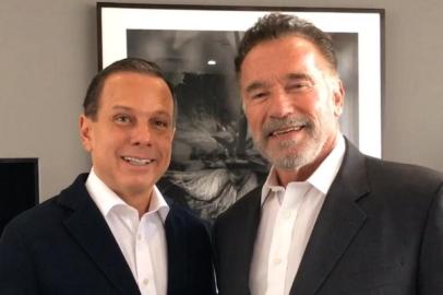 Doria com Arnold Schwarzenegger 