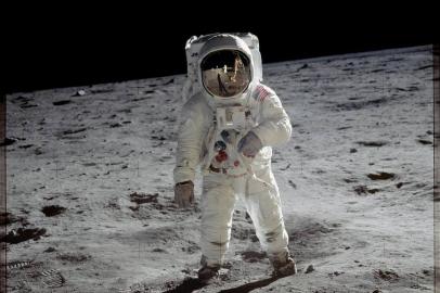 Astronaut Buzz Aldrin walks on the surface of the moon near the leg of the lunar module Eagle during the Apollo 11 mission. Mission commander Neil Armstrong took this photograph with a 70mm lunar surface camera. While astronauts Armstrong and Aldrin explored the Sea of Tranquility region of the moon, astronaut Michael Collins remained with the command and service modules in lunar orbit.