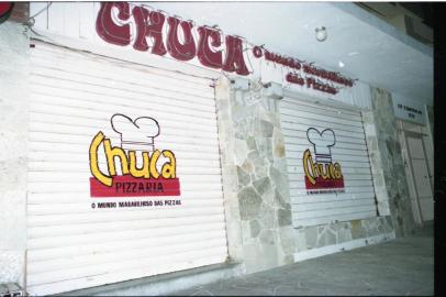  Fachada da Pizzaria Chuca, localizada na Avenida Getúlio Vargas, nº 1319, Bairro Menino Deus.-#ENVELOPE: 197454