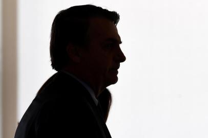 Brazilian President Jair Bolsonaro attends the new general officers promotion ceremony at the Planalto Palace in Brasilia, on April 5, 2019. - Bolsonaro completes his first 100 days of government next April 10. (Photo by EVARISTO SA / AFP)