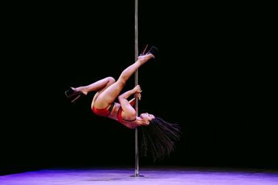 POLE-BURKE-ART-LSPR-042319Joscelyn Perez performs during the professional competition at the U.S. Pole Dance Championship in New York, April 13, 2019. Pole dancing, a curious hybrid of art, sport, exotic dance and fitness craze, has developed a mainstream following. (Nina Westervelt/The New York Times)Editoria: ELocal: NEW YORKIndexador: NINA WESTERVELTFonte: NYTNSFotógrafo: STR