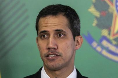  Venezuelan opposition leader and self-declared acting president Juan Guaido, speaks during a joint press conference with Brazil's President Jair Bolsonaro (out of frame) at Planalto palace in Brasilia on February 28, 2019. - Venezuela's opposition leader Juan Guaido was looking to secure reinforced Brazilian support from President Jair Bolsonaro on Thursday ahead of his return home to continue his challenge to socialist leader Nicolas Maduro. There are fears he might be arrested upon his return to Venezuela. (Photo by Sergio LIMA / AFP)Editoria: WARLocal: BrasíliaIndexador: SERGIO LIMASecao: crisisFonte: AFPFotógrafo: STR