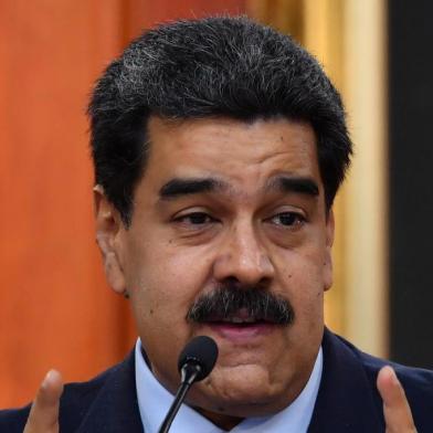  Venezuelan President Nicolas Maduro offers a press conference in Caracas, on January 25, 2019. - Venezuelas opposition leader Juan Guaido called Friday for a major demonstration next week to demand the resignation of President Nicolas Maduro, in his first public appearance since declaring himself acting president two days ago. (Photo by Yuri CORTEZ / AFP)Editoria: WARLocal: CaracasIndexador: YURI CORTEZSecao: crisisFonte: AFPFotógrafo: STF