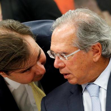 Brazils Lower House President Rodrigo Maia talks with Brazils Economy Minister Paulo Guedes during a session of the commission of the pension reform bill at the National Congress in BrasiliaBrazils Lower House President Rodrigo Maia talks with Brazils Economy Minister Paulo Guedes during a session of the commission of the pension reform bill at the National Congress in Brasilia, Brazil May 8, 2019. REUTERS/Adriano Machado ORG XMIT: GGGAHM20Local: BRASILIA ;BRAZIL