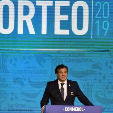 The president of the South American Football Confederation (Conmebol), Paraguayan Alejandro Dominguez, speaks during the Copa Libertadores round of 16 and the Copa Sudamericana second round draw in Luque, Paraguay on May 13, 2019. (Photo by NORBERTO DUARTE / AFP)