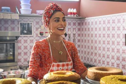 Maria da Paz ( Juliana Paes ) com os bolos. a dona do pedaço