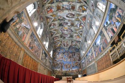 This picture shows a view inside the Sistine chapel ahead of a cardinals conclave on March 9, 2013 at the Vatican. The conclave of 115 cardinal electors will begin on March 12 under Michelangelos famous frescoes to choose the 266th pope following the abrupt end to Benedicts eight-year papacy which was often overshadowed by scandals.  AFP PHOTO / GABRIEL BOUYS