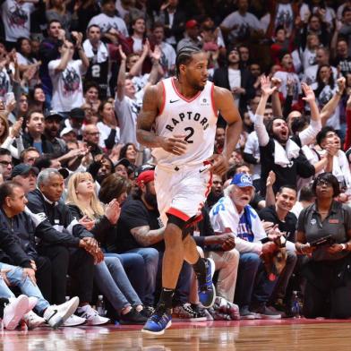 Eastern Conference Semi-Finals - Philadelphia 76ers v Toronto RaptorsTORONTO, CANADA - MAY 12: Kawhi Leonard #2 of the Toronto Raptors looks on against the Philadelphia 76ers during Game Seven of the Eastern Conference Semi-Finals of the 2019 NBA Playoffs on May 12, 2019 at the Scotiabank Arena in Toronto, Ontario, Canada. NOTE TO USER: User expressly acknowledges and agrees that, by downloading and or using this Photograph, user is consenting to the terms and conditions of the Getty Images License Agreement. Mandatory Copyright Notice: Copyright 2019 NBAE   Jesse D. Garrabrant/NBAE via Getty Images/AFPEditoria: SPOLocal: TorontoIndexador: Jesse D. GarrabrantSecao: BasketballFonte: NBAE / Getty ImagesFotógrafo: Contributor